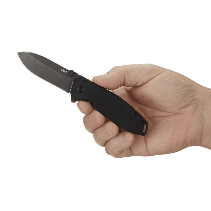 CRKT Squid XM Stonewash plain edge folding knife in hand